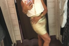Catenya McHenry models a gold and cream body con dress from Soco Boutique in Birmingham, Alabama