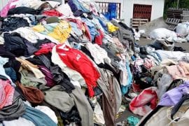 A pile of tossed our clothing causes waste on the site of catenya.com