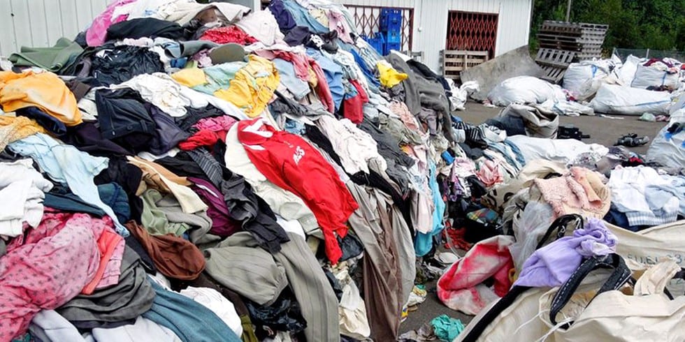 A pile of tossed our clothing causes waste on the site of catenya.com