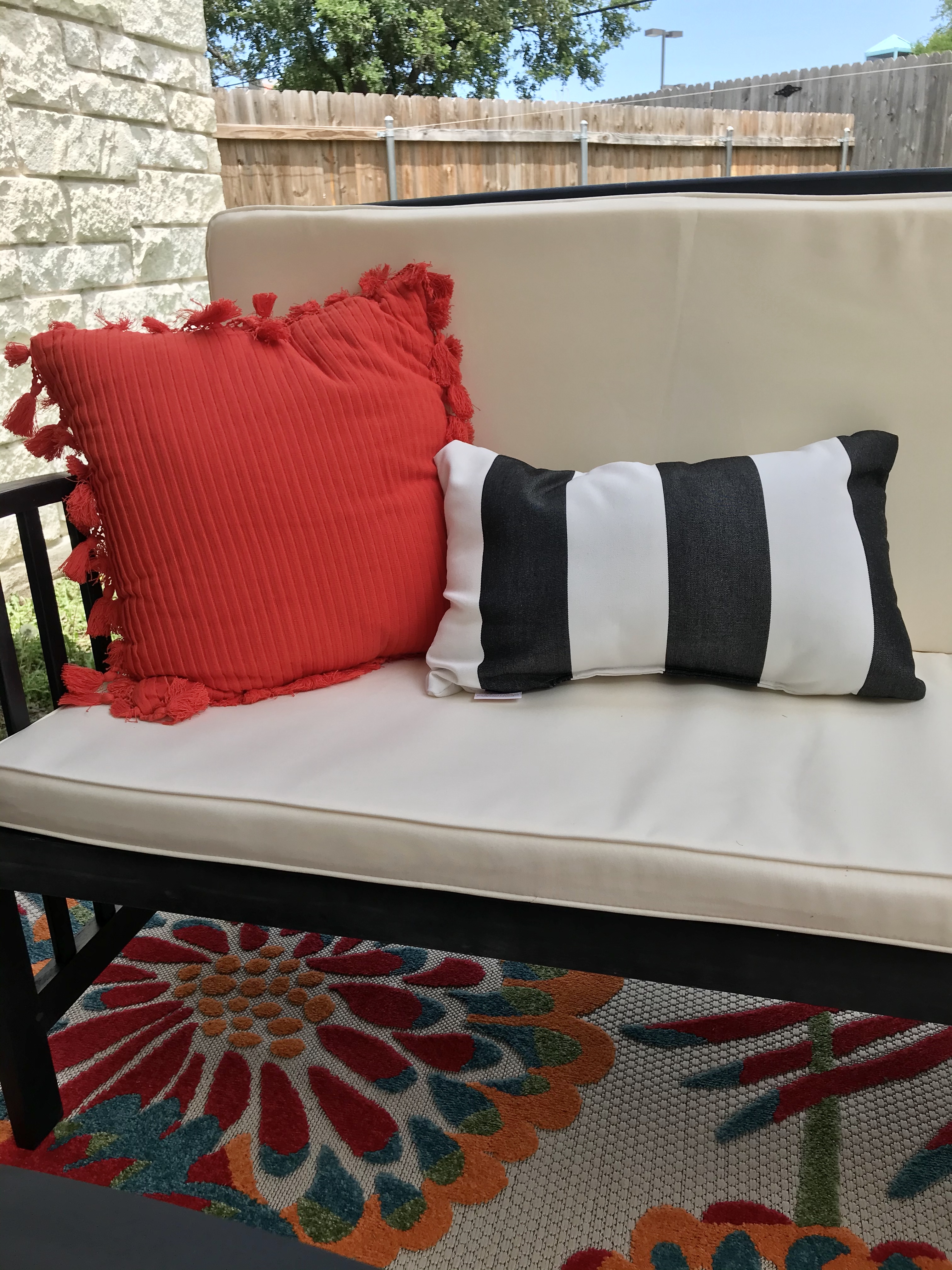 ReStylist Catenya McHenry creates an outdoor space by adding Sunbrella 2pk Cabana Classic Lumbar Outdoor Throw Pillows Black/White