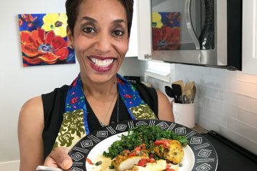 On season 2, episode 1 of The Mom Who Can't Cook show, Catenya McHenry cooks Aromatic Chicken breast with kale, red onions, and a tomato and chili salsa from The SirtFood Diet cook book.