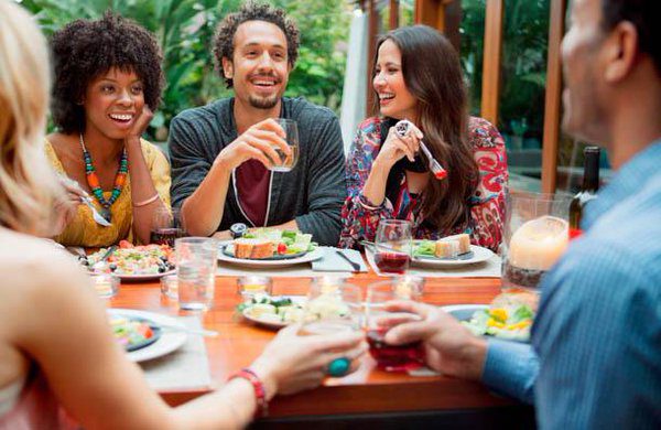 Couples with Friends at dinner featured on catenya.com
